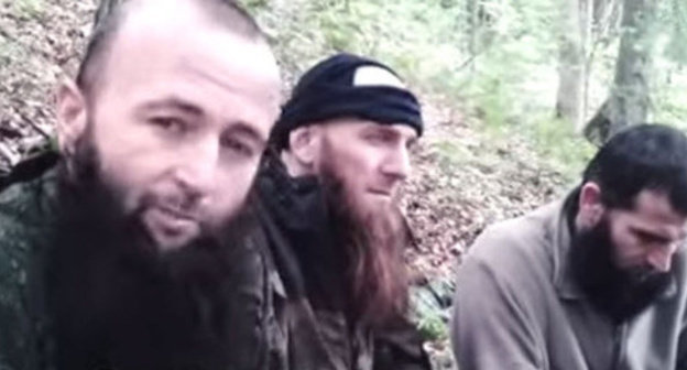 Screenshot from a video record of the burial of Doku Umarov, photo by YouTube user Albert Albertiny. Screenshot from a video record of the burial of Doku Umarov, photo by YouTube user Albert Albertiny.