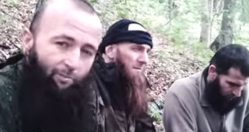 Screenshot from a video record of the burial of Doku Umarov, photo by YouTube user Albert Albertiny. Screenshot from a video record of the burial of Doku Umarov, photo by YouTube user Albert Albertiny.