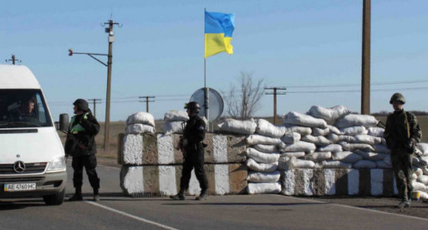 Checkpoint at Russian-Ukrainian border. 2014. Photo from the archive of the State Border Guard Service of Ukraine, dpsu.gov.ua/ru/about/photo_gallery/photo_gallery_214.htm Checkpoint at Russian-Ukrainian border. 2014. Photo from the archive of the State Border Guard Service of Ukraine, dpsu.gov.ua/ru/about/photo_gallery/photo_gallery_214.htm