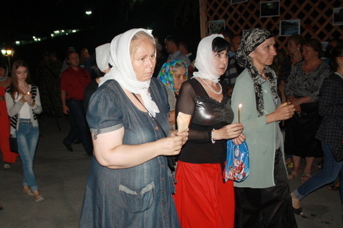 South Ossetia, Tskhinvali, night of August 7-8, 2014, sacred procession at the Temple of Nativity of the Blessed Virgin in commemoration of the 6th anniversary of the 2008 War. Photo by Maria Kotaeva for the ‘Caucasian Knot’. South Ossetia, Tskhinvali, night of August 7-8, 2014, sacred procession at the Temple of Nativity of the Blessed Virgin in commemoration of the 6th anniversary of the 2008 War. Photo by Maria Kotaeva for the ‘Caucasian Knot’.