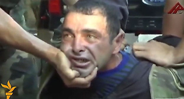 Karen Petrosyan, operative video footage. Photo: screenshot of a reportage made by Irina Ovannisyan http://rus.azatutyun.am/content/article/26525305.html Karen Petrosyan, operative video footage. Photo: screenshot of a reportage made by Irina Ovannisyan http://rus.azatutyun.am/content/article/26525305.html