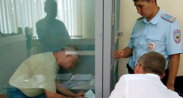 Mikhail Stolyarov (on the left) in the court room, Astrakhan, August 21, 2014. Photo by Elena Grebenyuk for the ‘Caucasian Knot’. Mikhail Stolyarov (on the left) in the court room, Astrakhan, August 21, 2014. Photo by Elena Grebenyuk for the ‘Caucasian Knot’.