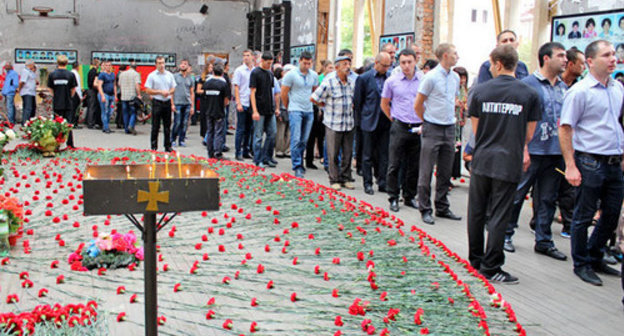 Mourning events to mark the tenth anniversary of the terror act in Beslan, September 1, 2014. Photo by Emma Marzoeva for the ‘Caucasian Knot’. Mourning events to mark the tenth anniversary of the terror act in Beslan, September 1, 2014. Photo by Emma Marzoeva for the ‘Caucasian Knot’.