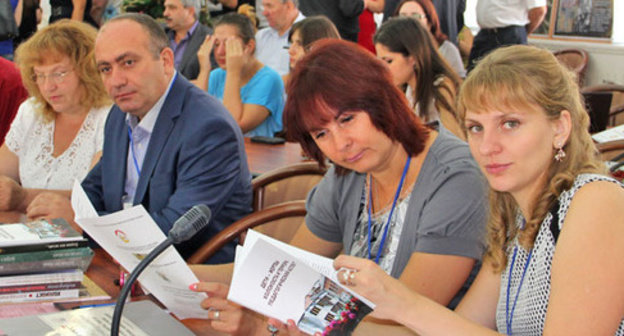 Participants of the second international forum "Children are the victims of terror in recent history: the problem of historical memory" dated to the 10th anniversary of the tragedy in Beslan. North Ossetia, Vladikavkaz, September 3, 2014. Photo by Khariton Kabisov for the ‘Caucaisian Knot’. Participants of the second international forum "Children are the victims of terror in recent history: the problem of historical memory" dated to the 10th anniversary of the tragedy in Beslan. North Ossetia, Vladikavkaz, September 3, 2014. Photo by Khariton Kabisov for the ‘Caucaisian Knot’.