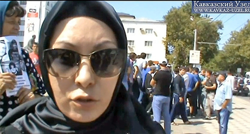 Madina Magomedova, a sister of one of the killed men. Photo: screenshot of a video by the "Caucasian Knot" Madina Magomedova, a sister of one of the killed men. Photo: screenshot of a video by the "Caucasian Knot"