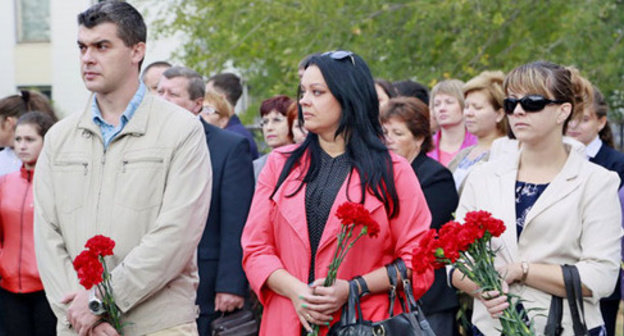Participants of the mourning events on the anniversary of the terror act in Volgodonsk in 1999, Volgodonsk, September 16, 2014. Photo: official website of Volgodonsk City Administration, http://volgodonskgorod.ru/node/9215 Participants of the mourning events on the anniversary of the terror act in Volgodonsk in 1999, Volgodonsk, September 16, 2014. Photo: official website of Volgodonsk City Administration, http://volgodonskgorod.ru/node/9215