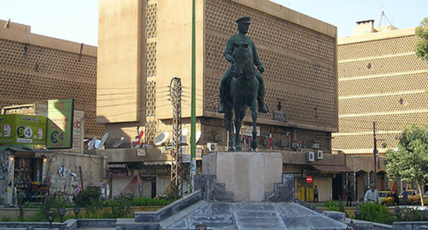 Square of the 8th of March, Deir ez-Zor. Photo http://commons.wikimedia.org/wiki/File:Deir_ez-Zour-March8Square_front.jpg Square of the 8th of March, Deir ez-Zor. Photo http://commons.wikimedia.org/wiki/File:Deir_ez-Zour-March8Square_front.jpg