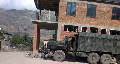 Law enforcers’ car in Vremenny. Photo made by residents of the settlement of Vremenny, Untsukul District of Dagestan, September 24, 2014. Law enforcers’ car in Vremenny. Photo made by residents of the settlement of Vremenny, Untsukul District of Dagestan, September 24, 2014.