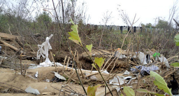 A dug-out at the cemetery where militants hid in the village of Psykhurei. KBR, October 8, 2014. Photo by Lyudmila Maratova for the "Caucasian Knot" A dug-out at the cemetery where militants hid in the village of Psykhurei. KBR, October 8, 2014. Photo by Lyudmila Maratova for the "Caucasian Knot"
