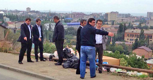 The heads of the administration of the Soviet District Court of Makhachkala inspect sanitary state of the platform containers and adjacent territory. Dagestan, October 2014. Photo: the official site of the administration of Makhachkalan http://www.mkala.ru/ The heads of the administration of the Soviet District Court of Makhachkala inspect sanitary state of the platform containers and adjacent territory. Dagestan, October 2014. Photo: the official site of the administration of Makhachkalan http://www.mkala.ru/