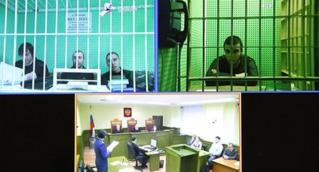 In the Russia's Supreme Court room during hearings on the case of the terror act at Moscow's Domodedovo Airport. Moscow, November 25, 2014. Photo by Magomed Tuayev for the ‘Caucasian Knot’. In the Russia's Supreme Court room during hearings on the case of the terror act at Moscow's Domodedovo Airport. Moscow, November 25, 2014. Photo by Magomed Tuayev for the ‘Caucasian Knot’.