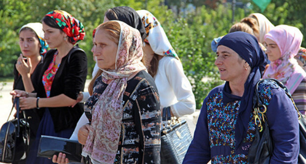 Residents of Grozny at the celebrations of the Republic Day. Grozny, September 2014. Photo by Magomed Magomedov for the ‘Caucasian Knot’. Residents of Grozny at the celebrations of the Republic Day. Grozny, September 2014. Photo by Magomed Magomedov for the ‘Caucasian Knot’.