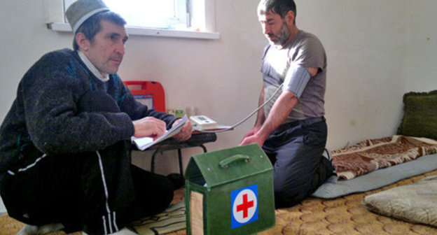 A doctor is measuring blood pressure of a hunger-striker. Karaman, November 2014. Photo by Rasul Magomedov for the "Caucasian Knot" A doctor is measuring blood pressure of a hunger-striker. Karaman, November 2014. Photo by Rasul Magomedov for the "Caucasian Knot"