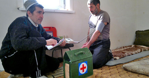 A doctor is measuring blood pressure of a hunger-striker. Karaman, November 2014. Photo by Rasul Magomedov for the "Caucasian Knot" A doctor is measuring blood pressure of a hunger-striker. Karaman, November 2014. Photo by Rasul Magomedov for the "Caucasian Knot"