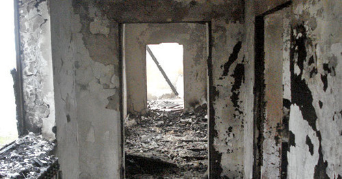 House burned down by law enforcers in the village of Yandi, Achkhoi-Martan District, December 7 2014. Photo provided by the HRC "Memorial" press-service. House burned down by law enforcers in the village of Yandi, Achkhoi-Martan District, December 7 2014. Photo provided by the HRC "Memorial" press-service.