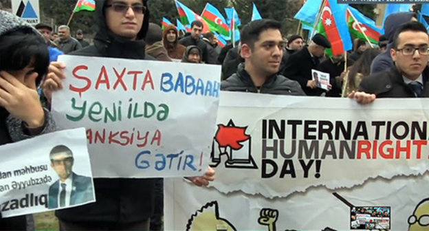 Participants of a protest actions in Baku. Photo: screenshot of a video by the "Caucasian Knot", http://www.youtube.com/watch?v=z1D6tYumVu8#t=17 Participants of a protest actions in Baku. Photo: screenshot of a video by the "Caucasian Knot", http://www.youtube.com/watch?v=z1D6tYumVu8#t=17