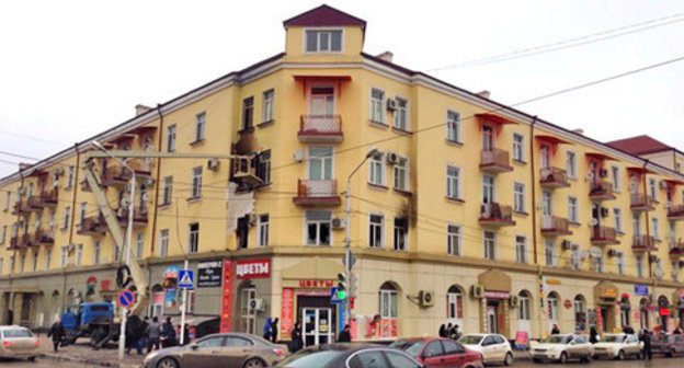 The building where the office of the Joint Mobile Group of the Committee against Torture (CaT) is located, after the fire. Grozny, December 154, 2014. Photo by Akhmed Aldebirov for the "Caucasian Knot" The building where the office of the Joint Mobile Group of the Committee against Torture (CaT) is located, after the fire. Grozny, December 154, 2014. Photo by Akhmed Aldebirov for the "Caucasian Knot"