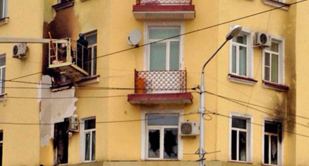 The building where the office of the Joint Mobile Group of the Committee against Torture (CaT) is located, after the fire. Grozny, December 154, 2014. Photo by Akhmed Aldebirov for the "Caucasian Knot" The building where the office of the Joint Mobile Group of the Committee against Torture (CaT) is located, after the fire. Grozny, December 154, 2014. Photo by Akhmed Aldebirov for the "Caucasian Knot"