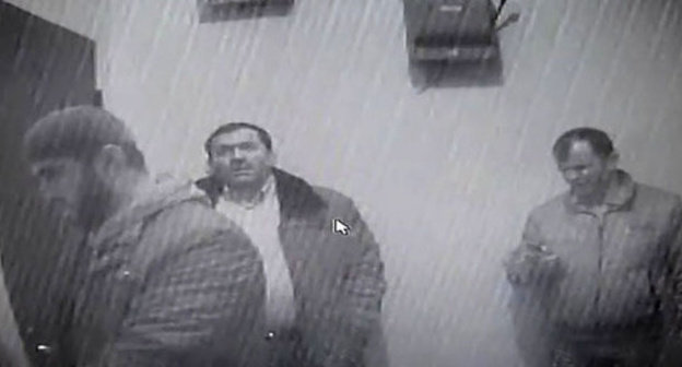 Strangers at the office of the Joint Mobile Group (JMG). Grozny, December 13, 2014. Screenshot of a video by the user Sergey Babinets http://www.youtube.com/ Strangers at the office of the Joint Mobile Group (JMG). Grozny, December 13, 2014. Screenshot of a video by the user Sergey Babinets http://www.youtube.com/