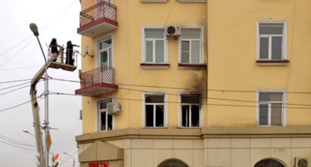 The building where the office of the Joint Mobile Group of the Committee against Torture (CaT) is located, after the fire. Grozny, December 154, 2014. Photo by Akhmed Aldebirov for the "Caucasian Knot" The building where the office of the Joint Mobile Group of the Committee against Torture (CaT) is located, after the fire. Grozny, December 154, 2014. Photo by Akhmed Aldebirov for the "Caucasian Knot"