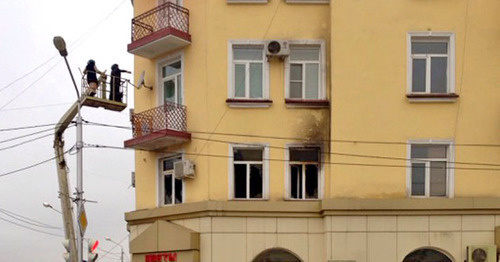 The building where the office of the Joint Mobile Group of the Committee against Torture (CaT) is located, after the fire. Grozny, December 154, 2014. Photo by Akhmed Aldebirov for the "Caucasian Knot" The building where the office of the Joint Mobile Group of the Committee against Torture (CaT) is located, after the fire. Grozny, December 154, 2014. Photo by Akhmed Aldebirov for the "Caucasian Knot"