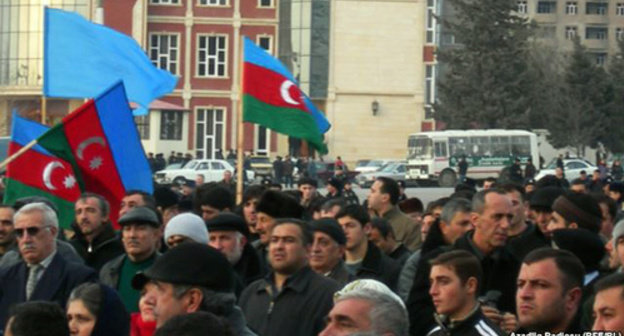 Protest action by the "Musavat" Party. Photo: RFE/RL, http://gdb.rferl.org/640C917B-8C1E-42B2-BDD2-E8289C4CDB3A_w640_r1_s_cx0_cy19_cw0.jpg Protest action by the "Musavat" Party. Photo: RFE/RL, http://gdb.rferl.org/640C917B-8C1E-42B2-BDD2-E8289C4CDB3A_w640_r1_s_cx0_cy19_cw0.jpg