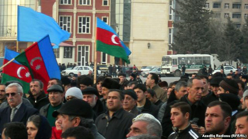 Protest action by the "Musavat" Party. Photo: RFE/RL, http://gdb.rferl.org/640C917B-8C1E-42B2-BDD2-E8289C4CDB3A_w640_r1_s_cx0_cy19_cw0.jpg
