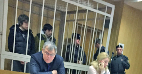 Timirlan Tsatsaev and Aslan Kautarov in the court room. Moscow, December 24, 2014. Photo by Azamat Mintsaev. Timirlan Tsatsaev and Aslan Kautarov in the court room. Moscow, December 24, 2014. Photo by Azamat Mintsaev.