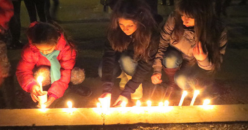 Action of lighting candles in memory of the deceased infant Sergey Avetisyan. Nagorny Karabakh, January 20, 2015. Photo by Alvard Grigoryan for the ‘Caucasian Knot’. Action of lighting candles in memory of the deceased infant Sergey Avetisyan. Nagorny Karabakh, January 20, 2015. Photo by Alvard Grigoryan for the ‘Caucasian Knot’.