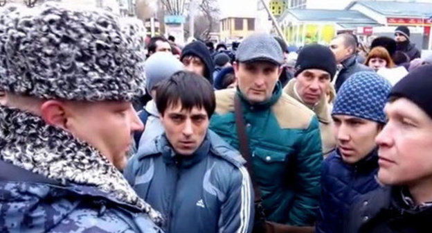 The participants of a people's assembly demanded from the authorities to fairly investigate the murder of a soldier. Minvody, January 24, 2015. Screenshot of a video by the user Roman Novikov http://www.youtube.com/watch?v=80uWjsfv-xk The participants of a people's assembly demanded from the authorities to fairly investigate the murder of a soldier. Minvody, January 24, 2015. Screenshot of a video by the user Roman Novikov http://www.youtube.com/watch?v=80uWjsfv-xk