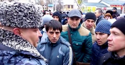 The participants of a people's assembly demanded from the authorities to fairly investigate the murder of a soldier. Minvody, January 24, 2015. Screenshot of a video by the user Roman Novikov http://www.youtube.com/watch?v=80uWjsfv-xk The participants of a people's assembly demanded from the authorities to fairly investigate the murder of a soldier. Minvody, January 24, 2015. Screenshot of a video by the user Roman Novikov http://www.youtube.com/watch?v=80uWjsfv-xk
