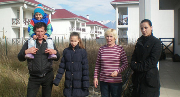 The Saveliev family at their new 'home'. Photo by Alexei Saveliev The Saveliev family at their new 'home'. Photo by Alexei Saveliev