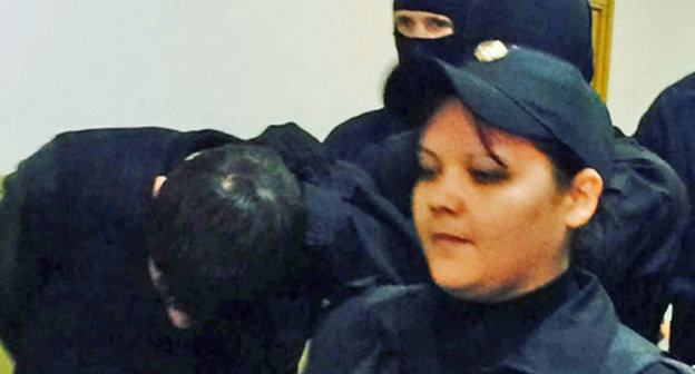 Zaur Dadaev is led through the corridor of the Basmanny Court of Moscow. March 8, 2015. Photo by the "Caucasian Knot"correspondent Zaur Dadaev is led through the corridor of the Basmanny Court of Moscow. March 8, 2015. Photo by the "Caucasian Knot"correspondent