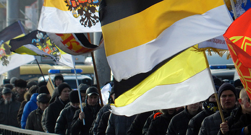 Participants of 'Russian march' holding imperial flags. Volgograd, November 4, 2014. Photo by Tatiana Filimonova for the ‘Caucasian Knot’. Participants of 'Russian march' holding imperial flags. Volgograd, November 4, 2014. Photo by Tatiana Filimonova for the ‘Caucasian Knot’.