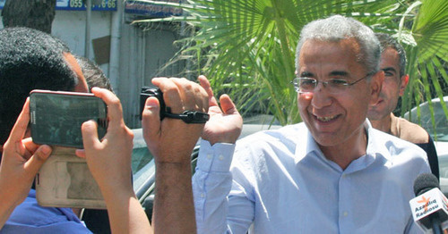 Intigam Aliev (to the right) during his detention. Baku, August 8, 2014. Photo by Aziz Karimov for the "Caucasian Knot". Intigam Aliev (to the right) during his detention. Baku, August 8, 2014. Photo by Aziz Karimov for the "Caucasian Knot".