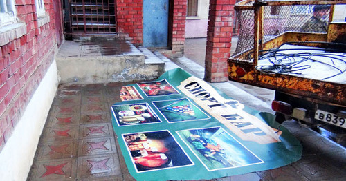 Banner taken from the bar by initiative group of parishioners of the central mosque of Buynaksk, March 7, 2015. Photo: Central mosque of Buynaksk website, http://almasjid.ru/rabota-po-snyatiyu-s-prilavkov-spirtnyx-napitkov-i-zakrytiyu-piv-barov-v-bujnakske/ Banner taken from the bar by initiative group of parishioners of the central mosque of Buynaksk, March 7, 2015. Photo: Central mosque of Buynaksk website, http://almasjid.ru/rabota-po-snyatiyu-s-prilavkov-spirtnyx-napitkov-i-zakrytiyu-piv-barov-v-bujnakske/