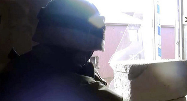 A law enforcer during special operation in Makhachkala. Photo: http://nac.gov.ru/nakmessage/2015/03/24/v-makhachkale-provedena-kontrterroristicheskaya-operatsiya-spasen-rebenok.html A law enforcer during special operation in Makhachkala. Photo: http://nac.gov.ru/nakmessage/2015/03/24/v-makhachkale-provedena-kontrterroristicheskaya-operatsiya-spasen-rebenok.html