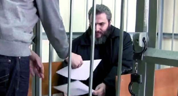 Boris Stomakhin in the courtroom. Screenshot of a video by the user sevikazia http://www.youtube.com/" Boris Stomakhin in the courtroom. Screenshot of a video by the user sevikazia http://www.youtube.com/"