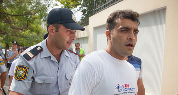 Rasul Jafarov at the rally in support of Pussy Riot in Baku, September 1, 2012. Photo by Aziz Karimov. Rasul Jafarov at the rally in support of Pussy Riot in Baku, September 1, 2012. Photo by Aziz Karimov.