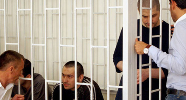 The defendants in the case of the terror act, which killed Sheikh Said Afandi al-Chirkawi and their advocates at the court session. Makhachkala, July 30, 2014. Photo by Aida Magomedova for the "Caucasian Knot"
