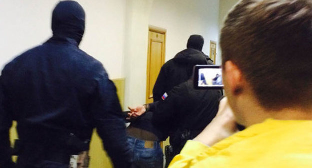 One of the defendants in the case of the Boris Nemtsov's murder is lead through the corridor of the Basmanny District Court of Moscow. March 2015. Photo by the "Caucasian Knot" correspondent One of the defendants in the case of the Boris Nemtsov's murder is lead through the corridor of the Basmanny District Court of Moscow. March 2015. Photo by the "Caucasian Knot" correspondent