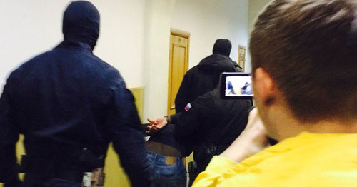 One of the defendants in the case of the Boris Nemtsov's murder is lead through the corridor of the Basmanny District Court of Moscow. March 2015. Photo by the "Caucasian Knot" correspondent One of the defendants in the case of the Boris Nemtsov's murder is lead through the corridor of the Basmanny District Court of Moscow. March 2015. Photo by the "Caucasian Knot" correspondent