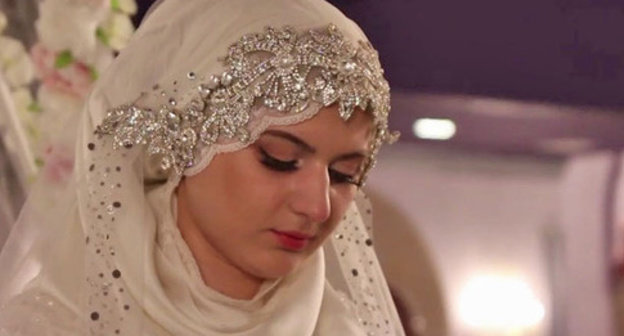 The wedding of the chief of the Nozhai-Yurt ROVD (District Interior Division) and a 17-year-old girl. Grozny, May 16, 2015. Screenshot of a video by the user Caucasian Policy https://www.youtube.com/watch?v=2xpRgf28g90 The wedding of the chief of the Nozhai-Yurt ROVD (District Interior Division) and a 17-year-old girl. Grozny, May 16, 2015. Screenshot of a video by the user Caucasian Policy https://www.youtube.com/watch?v=2xpRgf28g90