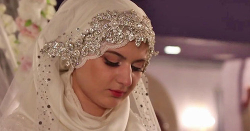 The wedding of the chief of the Nozhai-Yurt ROVD (District Interior Division) and a 17-year-old girl. Grozny, May 16, 2015. Screenshot of a video by the user Caucasian Policy https://www.youtube.com/watch?v=2xpRgf28g90 The wedding of the chief of the Nozhai-Yurt ROVD (District Interior Division) and a 17-year-old girl. Grozny, May 16, 2015. Screenshot of a video by the user Caucasian Policy https://www.youtube.com/watch?v=2xpRgf28g90