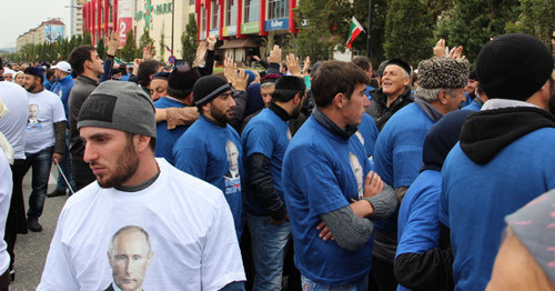 Young men at the rally on Putin's birthday in Grozny. Photo by Magomed Magomedov for the "Caucasian Knot" Young men at the rally on Putin's birthday in Grozny. Photo by Magomed Magomedov for the "Caucasian Knot"