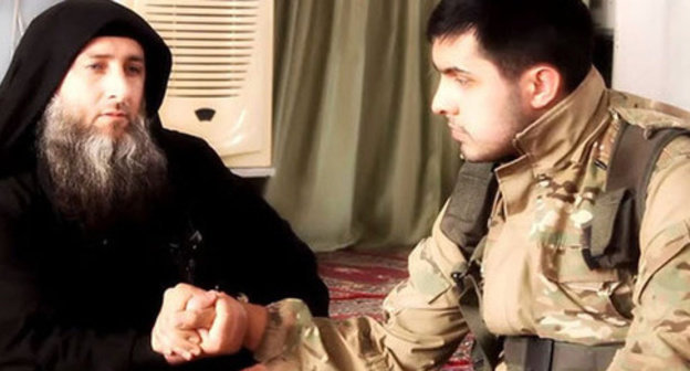 Dagestani preacher Nadir Abu Khalid (right) and Abu Jihad. Screenshot from the video posted by user kazim samu, http://www.youtube.com/watch?v=LC_SB4cGcl0