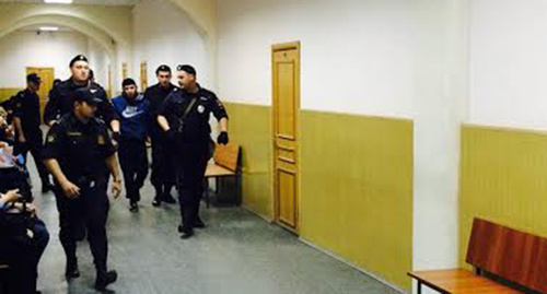 Dadaev is lead to the courtroom, May 13, 2015. Photo by Yuliya Buslavskaya for the "Caucasian Knot" Dadaev is lead to the courtroom, May 13, 2015. Photo by Yuliya Buslavskaya for the "Caucasian Knot"