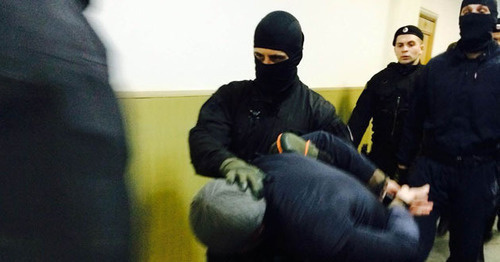 Anzor Gubashev is lead to the courtroom, March 2015. Photo by Yuliya Buslavskaya for the "Caucasian Knot" Anzor Gubashev is lead to the courtroom, March 2015. Photo by Yuliya Buslavskaya for the "Caucasian Knot"
