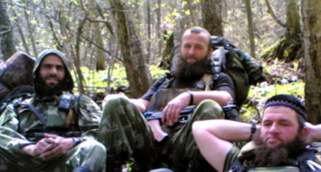 Aslan Byutukaev (in the centre). Photo from one of the web sites supporting militants Aslan Byutukaev (in the centre). Photo from one of the web sites supporting militants