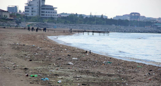 Caspian Sea beach in the town of Kaispiysk. Photo by Akhmed Aldebirov for the ‘Caucasian Knot’. Caspian Sea beach in the town of Kaispiysk. Photo by Akhmed Aldebirov for the ‘Caucasian Knot’.